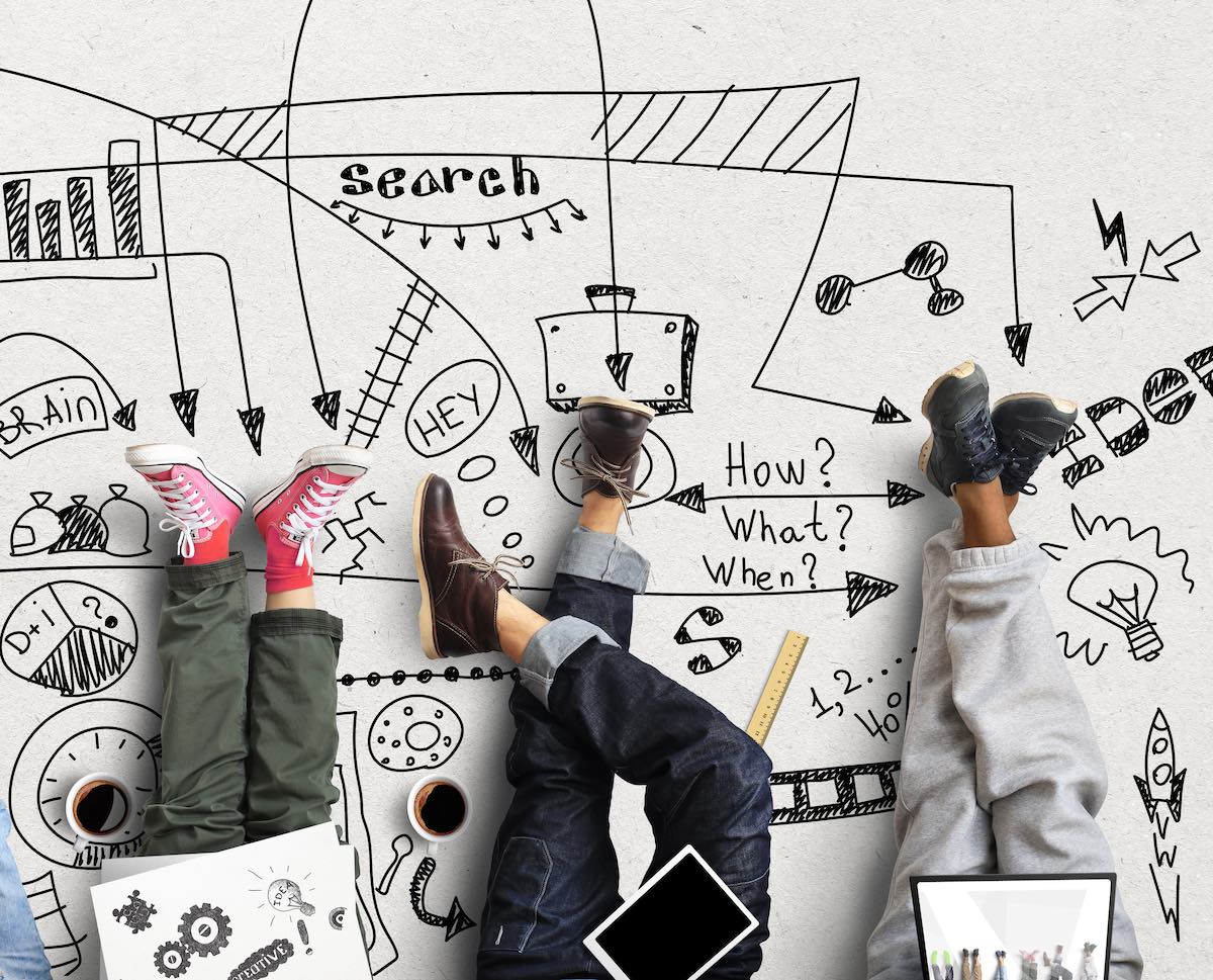 Image shows students getting creative using paper and digital resources