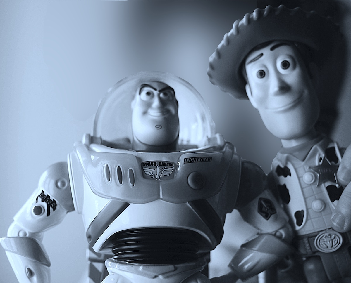 Image shows a picture of Woody and Buzz from the animated film Toy Story